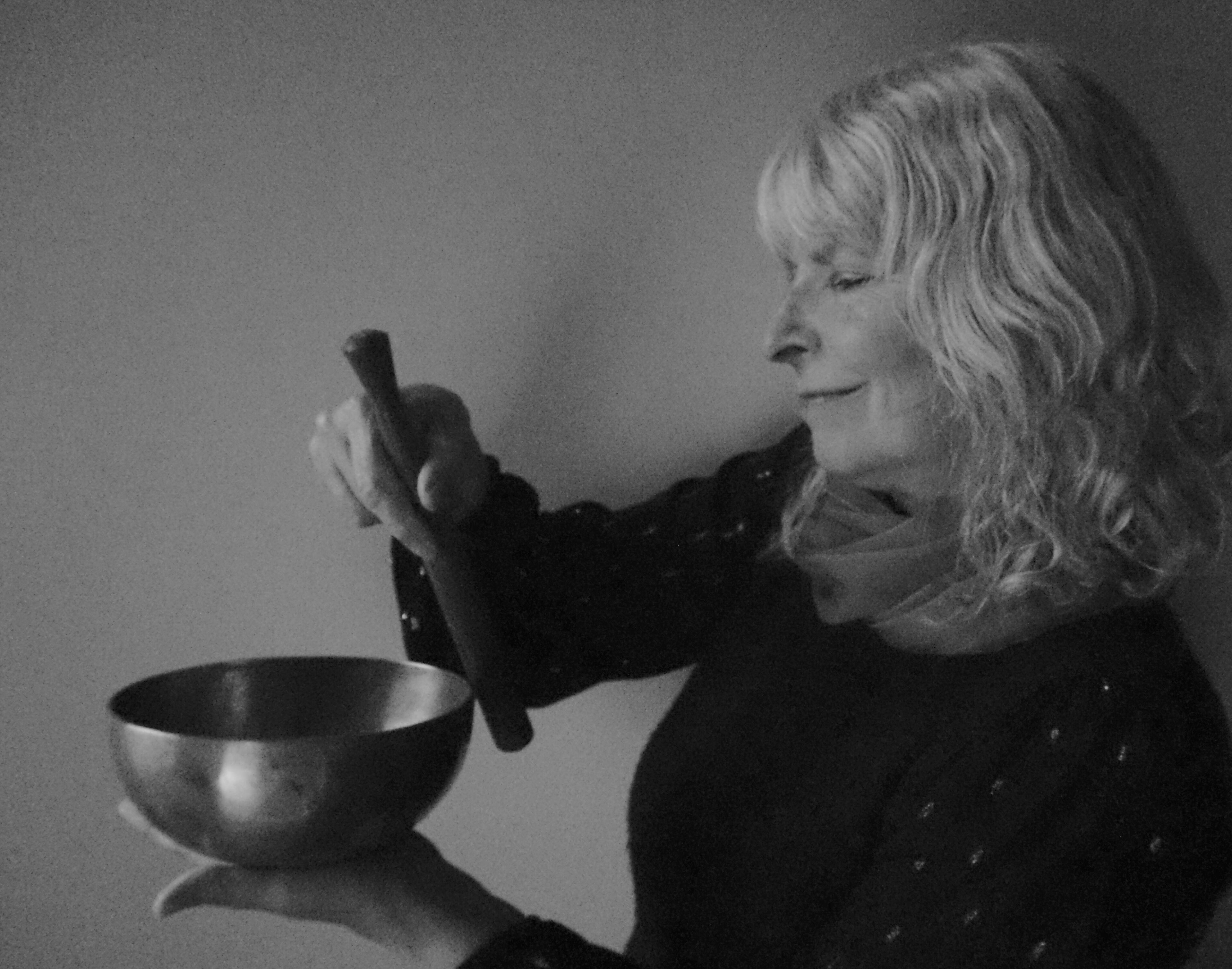 Nicola is seen playing the singing bowl. Photo: Rupert
